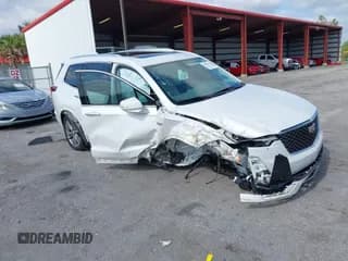 ✅ 2023 Cadillac XT6 FWD Premium Luxury • VIN: 1GYKPCRS3PZ186210 • Лот: 42290027. Опубликован ранее на IAAI с пробегом 44 117 миль. Бесплатный доступ к архиву аукционных продаж из США и подробный отчёт об истории автомобиля на DreamBid. Изображение 1.