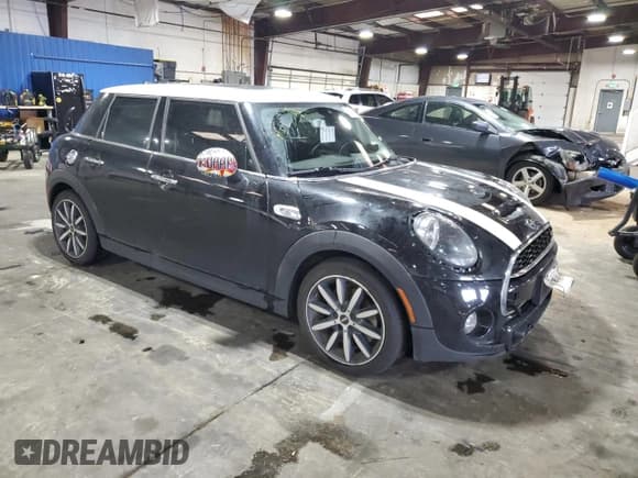✅ 2019 MINI Hardtop 4 Door Cooper S • VIN: WMWXU3C57K2H86835 • Lot: 82134055. Listed on Copart with 42,662 mi. Free auction sales archive from the USA and detailed vehicle history report at DreamBid. Image 4.