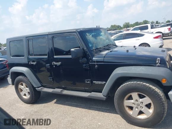 ✅ 2008 Jeep Wrangler Unlimited X • VIN: 1J4GA39148L612425 • Lot: 43266301. Listed on IAAI with 196,635 mi. Free auction sales archive from the USA and detailed vehicle history report at DreamBid. Image 13.