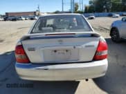 ✅ 2001 Mazda Protege LX • VIN: JM1BJ225310415678 • Lot: 75444624. Wystawiony na Copart z przebiegiem 148 790 mil. Bezpłatny archiwum sprzedaży aukcyjnych z USA i szczegółowy raport historii pojazdu na DreamBid. Zdjęcie 6.