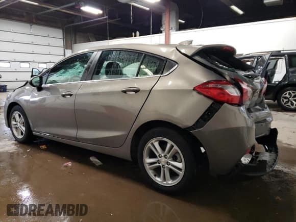 ✅ 2018 Chevrolet Cruze LT • VIN: 3G1BE6SM5JS593547 • Lot: 70024232. Listed on Copart with 22,114 mi. Free auction sales archive from the USA and detailed vehicle history report at DreamBid. Image 2.