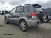 ✅ 2003 Toyota RAV4 • VIN: JTEGH20V630118925 • Lot: 93325175. Listed on Copart with 257,230 mi. Free auction sales archive from the USA and detailed vehicle history report at DreamBid. Image 2.