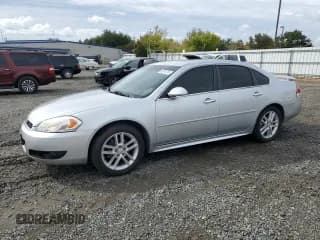 ✅ 2014 Chevrolet Impala LTZ • VIN: 2G1WC5E38E1147222 • Lot: 82001215. Listed on Copart with 160,275 mi. Free auction sales archive from the USA and detailed vehicle history report at DreamBid. Image 1.