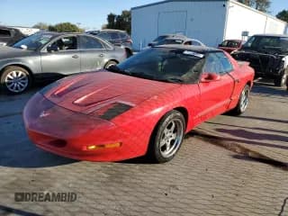 ✅ 1995 Pontiac Firebird Firebird • VIN: 2G2FS22S5S2247034 • Lot: 77779784. Listed on Copart with 113,891 mi. Free auction sales archive from the USA and detailed vehicle history report at DreamBid. Image 1.