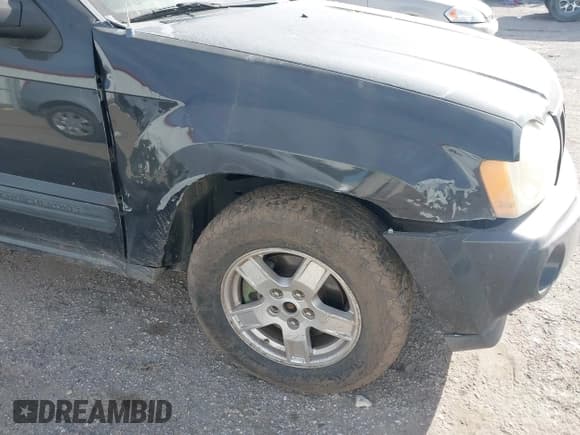 ✅ 2005 Jeep Grand Cherokee Laredo • VIN: 1J4HR48N25C542250 • Lot: 43600890. Listed on IAAI with 286,112 mi. Free auction sales archive from the USA and detailed vehicle history report at DreamBid. Image 6.