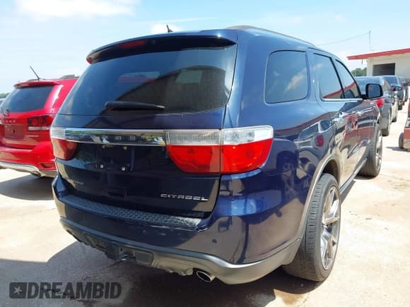 ✅ 2013 Dodge Durango Citadel • VIN: 1C4SDHET2DC665680 • Lot: 42407968. Listed on IAAI with 214,019 mi. Free auction sales archive from the USA and detailed vehicle history report at DreamBid. Image 4.