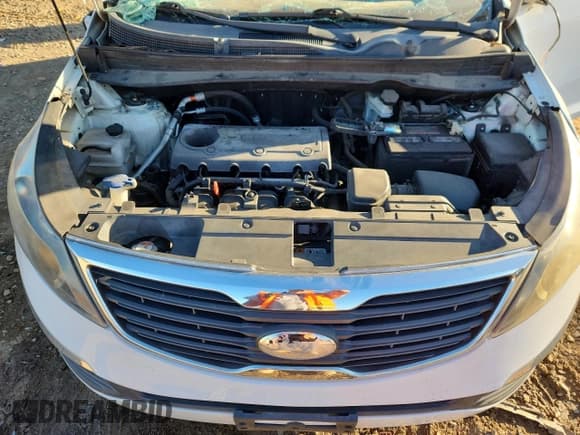 ✅ 2013 Kia Sportage LX • VIN: KNDPB3A2XD7529088 • Lot: 82381955. Listed on Copart with 116,585 mi. Free auction sales archive from the USA and detailed vehicle history report at DreamBid. Image 12.