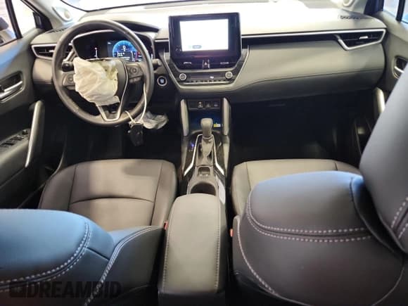 ✅ 2023 Toyota Corolla Cross XLE • VIN: 7MUDAABG7PV054407 • Lot: 90499265. Listed on Copart with 31,853 mi. Free auction sales archive from the USA and detailed vehicle history report at DreamBid. Image 8.