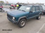 ✅ 1995 Jeep Cherokee SE • VIN: 1J4FJ28S9SL657965 • Lot: 43840644. Listed on IAAI with 270,929 mi. Free auction sales archive from the USA and detailed vehicle history report at DreamBid. Image 2.