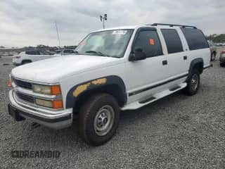1997 Chevrolet Suburban z VIN 3GNGK26J1VG140914, wystawiony jako Copart lot #76651774 z przebiegiem 245 981 mil mil oraz Szkoda całkowita • Salvage title. Historia ofert i sprzedaży dostępna na DreamBid. Obrazek 1.
