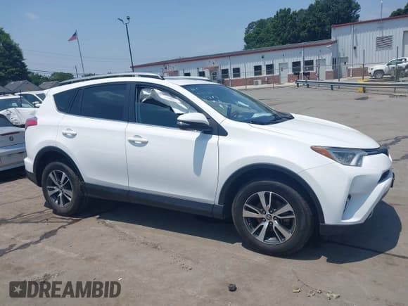 ✅ 2018 Toyota RAV4 XLE • VIN: 2T3WFREV1JW459553 • Lot: 42423474. Listed on IAAI with 129,523 mi. Free auction sales archive from the USA and detailed vehicle history report at DreamBid. Image 13.