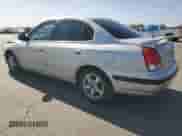 2003 Hyundai Elantra GLS z VIN KMHDN45D33U629413, wystawiony jako Copart lot #78414854 z przebiegiem 195 266 mil mil oraz Szkoda całkowita • Salvage title. Historia ofert i sprzedaży dostępna na DreamBid. Obrazek 2.