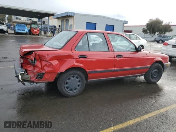 ✅ 1992 Nissan Sentra E • VIN: JN1EB31P1NU121278 • Lot: 84889294. Listed on Copart with 128,445 mi. Free auction sales archive from the USA and detailed vehicle history report at DreamBid. Image 3.