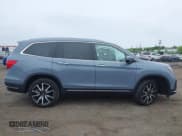 ✅ 2022 Honda Pilot Touring 7-Passenger • VIN: 5FNYF6H68NB056077 • Lot: 42357338. Listed on IAAI with 18,193 mi. Free auction sales archive from the USA and detailed vehicle history report at DreamBid. Image 13.