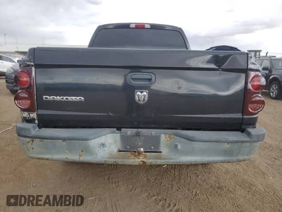 2007 Dodge Dakota ST with VIN 1D7HE28KX7S215055, listed as a Copart auction lot 79550814 with 103,988 mi miles and Salvage title. Bid and sale history available at DreamBid. Image 6.