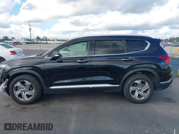 ✅ 2022 Hyundai Santa Fe SEL • VIN: 5NMS34AJ3NH404867 • Lot: 43484971. Listed on IAAI with 163,193 mi. Free auction sales archive from the USA and detailed vehicle history report at DreamBid. Image 15.