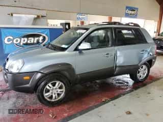 2006 Hyundai Tucson GLS z VIN KM8JN72D26U346076, wystawiony jako Copart lot #77447474 z przebiegiem 123 993 mil mil oraz Szkoda całkowita • Salvage title. Historia ofert i sprzedaży dostępna na DreamBid. Obrazek 1.