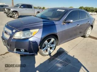 ✅ 2013 Chevrolet Malibu LTZ • VIN: 1G11J5SX6DF233000 • Lot: 82540505. Listed on Copart with 156,944 mi. Free auction sales archive from the USA and detailed vehicle history report at DreamBid. Image 1.