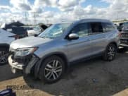 ✅ 2017 Honda Pilot Touring • VIN: 5FNYF5H92HB046640 • Lot: 87243885. Listed on Copart with 112,152 mi. Free auction sales archive from the USA and detailed vehicle history report at DreamBid. Image 1.