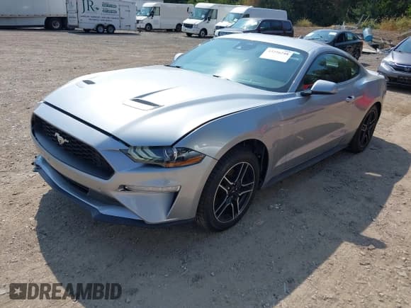 ✅ 2023 Ford Mustang EcoBoost • VIN: 1FA6P8THXP5102382 • Lot: 43256248. Listed on IAAI with 45,370 mi. Free auction sales archive from the USA and detailed vehicle history report at DreamBid. Image 2.