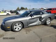 ✅ 2012 Dodge Challenger SXT • VIN: 2C3CDYAG0CH228029 • Lot: 77434704. Wystawiony na Copart z przebiegiem 133 272 mil. Bezpłatny archiwum sprzedaży aukcyjnych z USA i szczegółowy raport historii pojazdu na DreamBid. Zdjęcie 1.