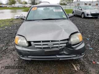 2003 Hyundai Accent GL z VIN KMHCG35C33U261046, wystawiony jako Copart lot #48846125 z przebiegiem 108 742 mil mil oraz Szkoda całkowita • Salvage title. Historia ofert i sprzedaży dostępna na DreamBid. Obrazek 5.