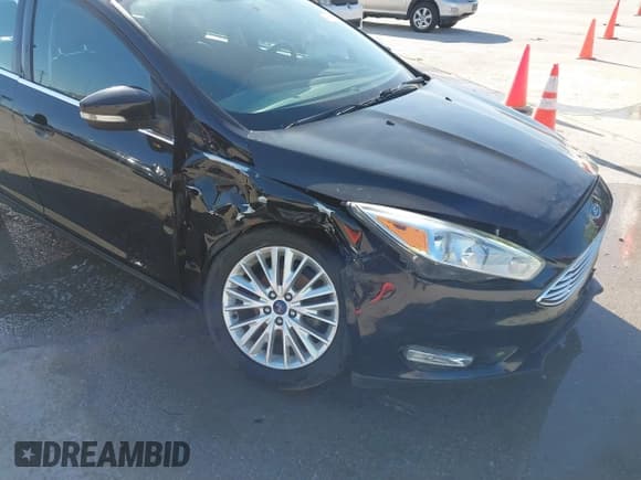 ✅ 2017 Ford Focus Titanium • VIN: 1FADP3J2XHL328847 • Lot: 41740627. Listed on IAAI with 89,276 mi. Free auction sales archive from the USA and detailed vehicle history report at DreamBid. Image 6.