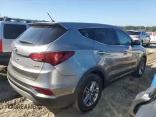 2018 Hyundai Santa Fe 2.4L z VIN 5XYZT3LB7JG559148, wystawiony jako Copart lot #84760925 z przebiegiem 147 179 mil mil oraz Czysty tytuł • Clean title. Historia ofert i sprzedaży dostępna na DreamBid. Obrazek 3.