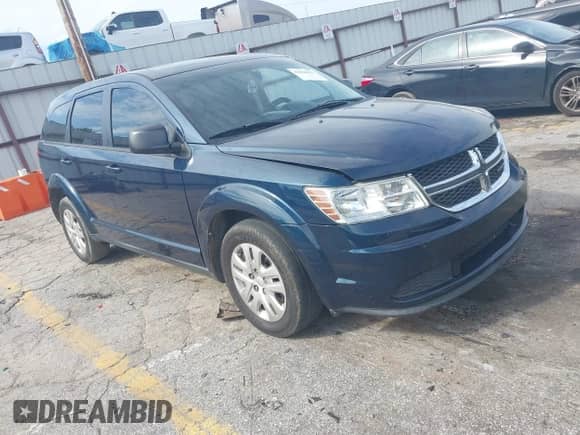 2015 Dodge Journey American Value z VIN 3C4PDCABXFT610861, wystawiony jako IAAI lot #43068421 z przebiegiem 153 937 mil mil oraz . Historia ofert i sprzedaży dostępna na DreamBid. Obrazek 1.