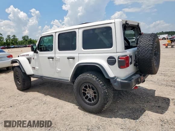 ✅ 2021 Jeep Wrangler Unlimited Rubicon • VIN: 1C4JJXFG1MW849460 • Лот: 62701895. Опубликован ранее на Copart с пробегом 54 517 миль. Бесплатный доступ к архиву аукционных продаж из США и подробный отчёт об истории автомобиля на DreamBid. Изображение 2.