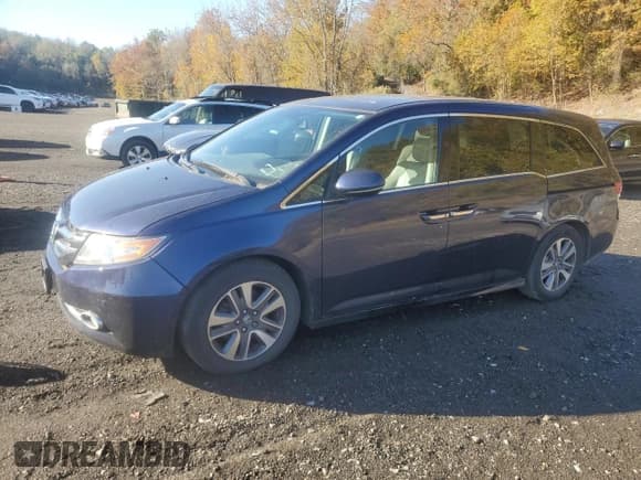 ✅ 2014 Honda Odyssey Touring • VIN: 5FNRL5H95EB025631 • Lot: 87088345. Listed on Copart with 144,539 mi. Free auction sales archive from the USA and detailed vehicle history report at DreamBid. Image 1.