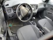 ✅ 2009 Kia Rio LX • VIN: KNADE223996557440 • Lot: 73925134. Listed on Copart with Not provided. Free auction sales archive from the USA and detailed vehicle history report at DreamBid. Image 8.