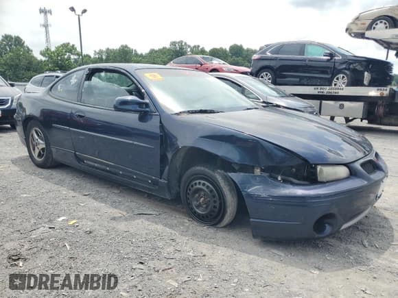 ✅ 2002 Pontiac Grand Prix GT • VIN: 1G2WP12KX2F162720 • Лот: 64205605. Опубликован ранее на Copart с пробегом 181 542 миль. Бесплатный доступ к архиву аукционных продаж из США и подробный отчёт об истории автомобиля на DreamBid. Изображение 4.