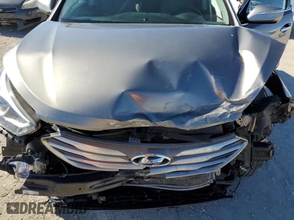 ✅ 2017 Hyundai Santa Fe 2.4L • VIN: 5NMZUDLB9HH050262 • Лот: 41228764. Опубликован ранее на Copart с пробегом 89 741 миль. Бесплатный доступ к архиву аукционных продаж из США и подробный отчёт об истории автомобиля на DreamBid. Изображение 12.