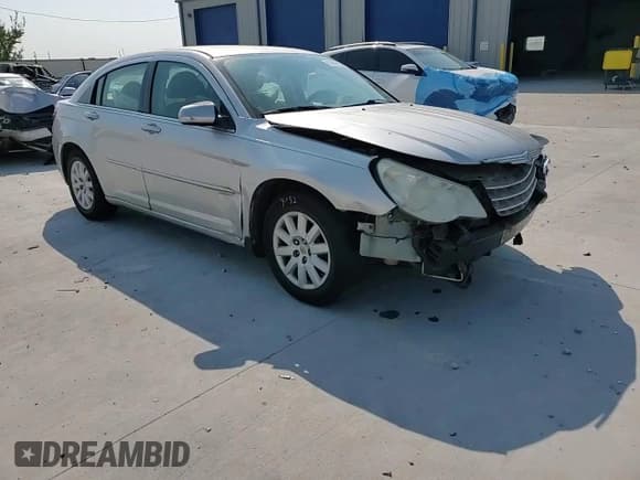 ✅ 2007 Chrysler Sebring • VIN: 1C3LC46K17N550846 • Lot: 81664645. Listed on Copart with 129,380 mi. Free auction sales archive from the USA and detailed vehicle history report at DreamBid. Image 14.