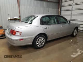 ✅ 2005 Kia Amanti • VIN: KNALD124155057774 • Лот: 76788204. Опубликован ранее на Copart с пробегом 72 843 миль. Бесплатный доступ к архиву аукционных продаж из США и подробный отчёт об истории автомобиля на DreamBid. Изображение 3.