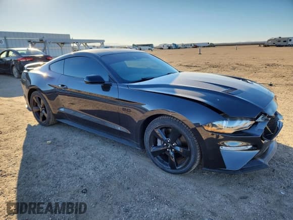 ✅ 2022 Ford Mustang GT • VIN: 1FA6P8CF9N5107990 • Lot: 89448555. Listed on Copart with 35,540 mi. Free auction sales archive from the USA and detailed vehicle history report at DreamBid. Image 4.