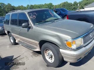 ✅ 2001 Mercury Mountaineer • VIN: 4M2ZU86P61UJ00123 • Lot: 42692270. Listed on IAAI with 261,819 mi. Free auction sales archive from the USA and detailed vehicle history report at DreamBid. Image 1.