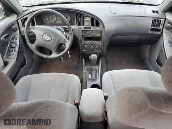 2005 Hyundai Elantra GLS z VIN KMHDN46D75U146640, wystawiony jako Copart lot #81188684 z przebiegiem 223 869 mil mil oraz Szkoda całkowita • Salvage title. Historia ofert i sprzedaży dostępna na DreamBid. Obrazek 8.