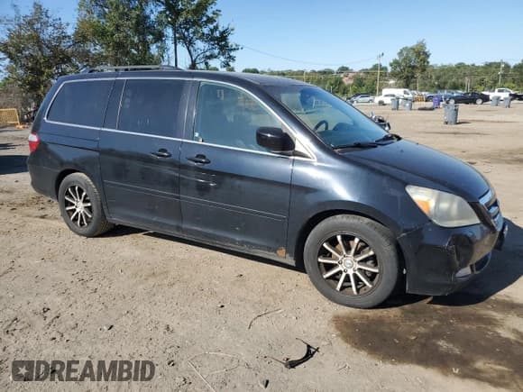 ✅ 2007 Honda Odyssey Touring • VIN: 5FNRL38807B110780 • Lot: 81973585. Listed on Copart with 220,665 mi. Free auction sales archive from the USA and detailed vehicle history report at DreamBid. Image 4.
