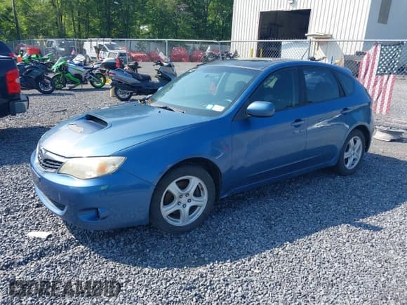 ✅ 2009 Subaru Impreza WRX • VIN: JF1GH74609H815480 • Lot: 42769864. Listed on IAAI with 149,179 mi. Free auction sales archive from the USA and detailed vehicle history report at DreamBid. Image 2.