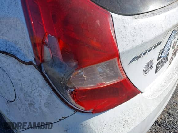 2013 Hyundai Accent SE with VIN KMHCU5AEXDU122478, listed as a IAAI auction lot 43616371 with 141,000 mi miles and . Bid and sale history available at DreamBid. Image 13.