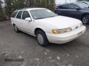✅ 1994 Ford Taurus GL • VIN: 1FALP57U4RG263732 • Lot: 43801365. Listed on IAAI with 141,636 mi. Free auction sales archive from the USA and detailed vehicle history report at DreamBid. Image 1.