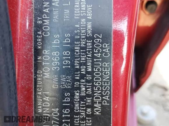 2005 Hyundai Elantra GLS z VIN KMHDN56D05U145092, wystawiony jako Copart lot #76075964 z przebiegiem 139 245 mil mil oraz Szkoda całkowita • Salvage title. Historia ofert i sprzedaży dostępna na DreamBid. Obrazek 13.