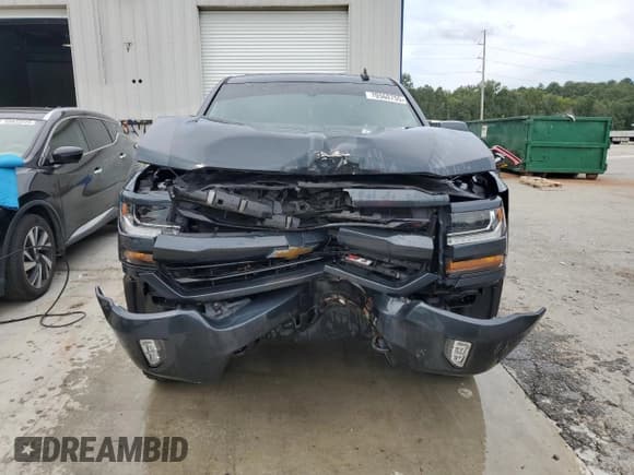 ✅ 2018 Chevrolet Silverado 1500 LT • VIN: 1GCVKREC5JZ128514 • Лот: 70560755. Опубликован ранее на Copart с пробегом 121 035 миль. Бесплатный доступ к архиву аукционных продаж из США и подробный отчёт об истории автомобиля на DreamBid. Изображение 5.