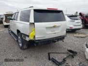 ✅ 2015 Chevrolet Suburban LTZ • VIN: 1GNSKKKC7FR290156 • Lot: 43777007. Listed on IAAI with 145,354 mi. Free auction sales archive from the USA and detailed vehicle history report at DreamBid. Image 3.