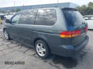 ✅ 2004 Honda Odyssey EX-L • VIN: 5FNRL18734B106472 • Lot: 43249255. Wystawiony na IAAI z przebiegiem 249 849 mil. Bezpłatny archiwum sprzedaży aukcyjnych z USA i szczegółowy raport historii pojazdu na DreamBid. Zdjęcie 3.