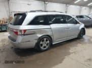 ✅ 2012 Honda Odyssey Touring • VIN: 5FNRL5H99CB052361 • Lot: 42332298. Listed on IAAI with 185,914 mi. Free auction sales archive from the USA and detailed vehicle history report at DreamBid. Image 4.