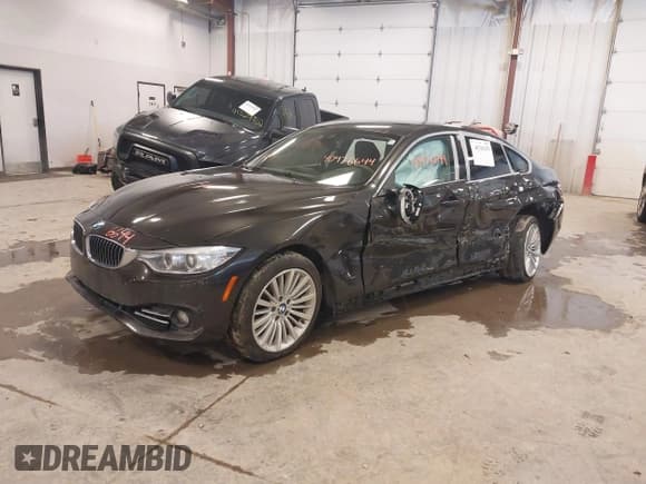 ✅ 2015 BMW 4 Series 435i xDrive • VIN: WBA4B3C54FGV48147 • Lot: 41310255. Listed on IAAI with 93,273 mi. Free auction sales archive from the USA and detailed vehicle history report at DreamBid. Image 17.