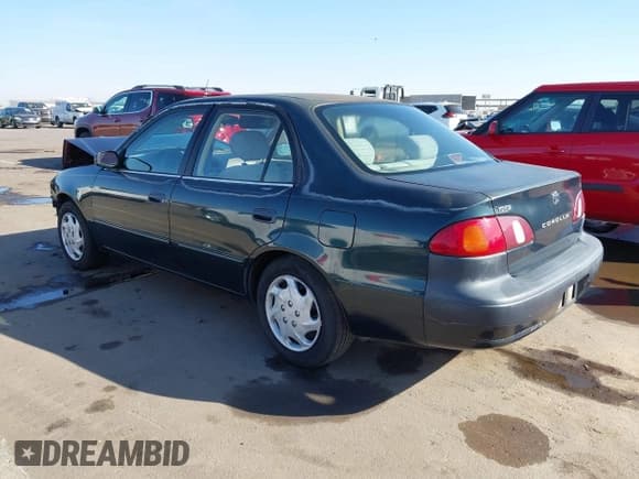 ✅ 1999 Toyota Corolla CE • VIN: 1NXBR12EXXZ252527 • Lot: 43668301. Listed on IAAI with 134,473 mi. Free auction sales archive from the USA and detailed vehicle history report at DreamBid. Image 3.